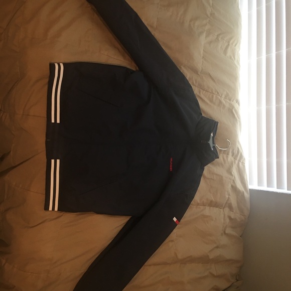 Brand New never worn. Has a hood inside